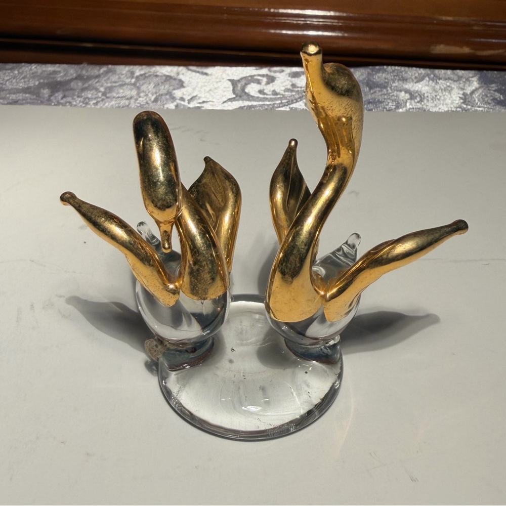 Vintage art glass swan figurines, clear glass bodies and gold-accented wings